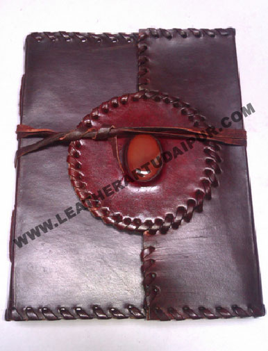 stone with stitching Leather Journal