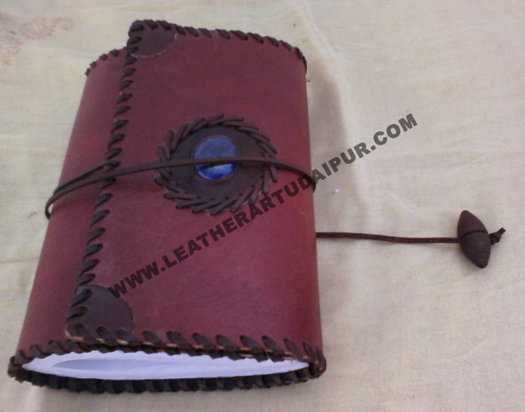 stone with stitching Leather Journal